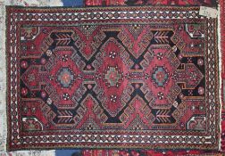 A Persian rug, length 159cm.