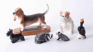 A Beswick bulldog, height 13cm, two Beswick badgers, a Scottish terrier, a basset hound