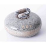 A heavy granite curling stone, diameter approx. 30cm.