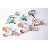 A set of three Beswick graduated flying birds together with a set of four Beswick flying