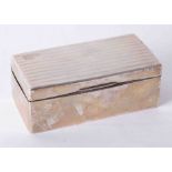 A George V silver rectangular cigarette box, WN Limited.