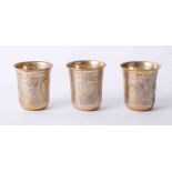 Three gilt silver and Niello Beaker Cups, Moscow, Russia, of circular tapering form and engraved,