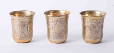 Three gilt silver and Niello Beaker Cups, Moscow, Russia, of circular tapering form and engraved,