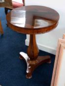 An early Victorian rosewood pedestal wine table with circular top, diameter 52cm.