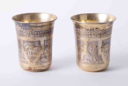 A pair gilt silver and Niello Beaker Cups, Moscow, Russia, of circular tapering form and engraved,