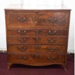 A Georgian mahogany secretaire chest, the upper drawer with a fitted interior over four long