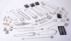 A box of various diamante set costume jewellery.