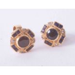 A pair of 18ct yellow gold dark blue sapphire & small diamond cluster earrings, approx. 4.3g.