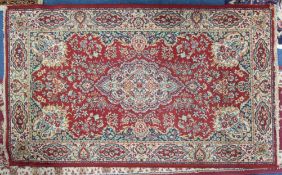 A Persian rug, length 161cm.