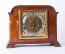 An Elliott chiming mantel clock in mahogany case, height 23cm.