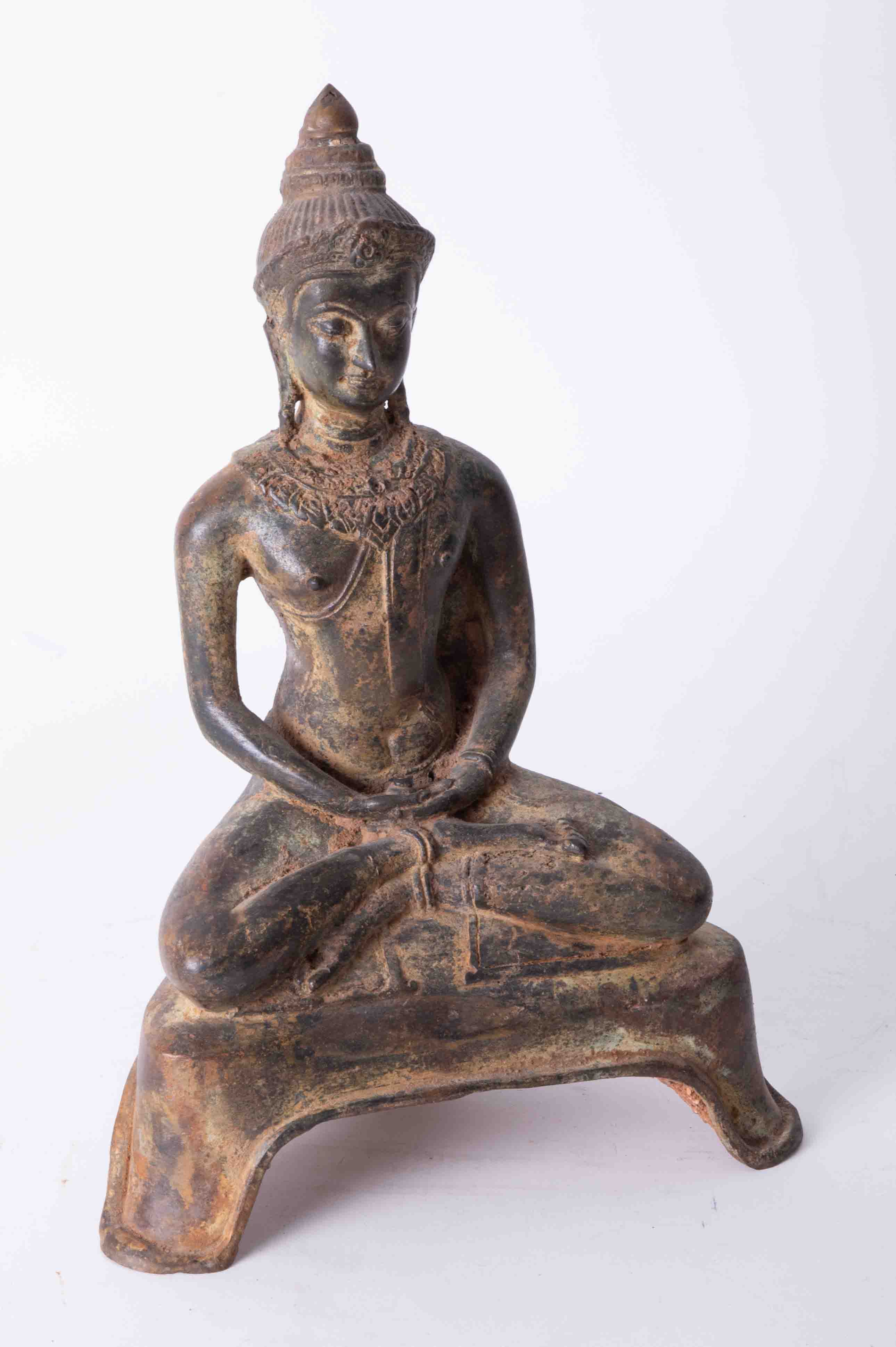 A seated metal Buddha with certificate from the Yikhang Museum, 2006, suggest indicating copper,