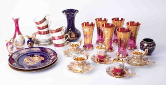 A collection of 20th Century Limoge porcelain together with a set of six Cranberry and over-gilt