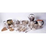 A quantity of silver plated wares including spirit kettle, part tea sets, trays, also some