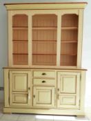 A modern French two part dresser painted in cream, width 167cm, overall height 218cm, upper