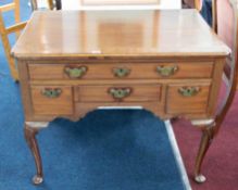 A Georgian mahogany lowboy, fitted with four drawers, height 70cm, width 89cm.