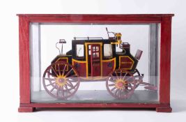 A cased model of a Stage Coach, 'Coventry to Chester', the cabinet 39cm x 25cm x 18cm.