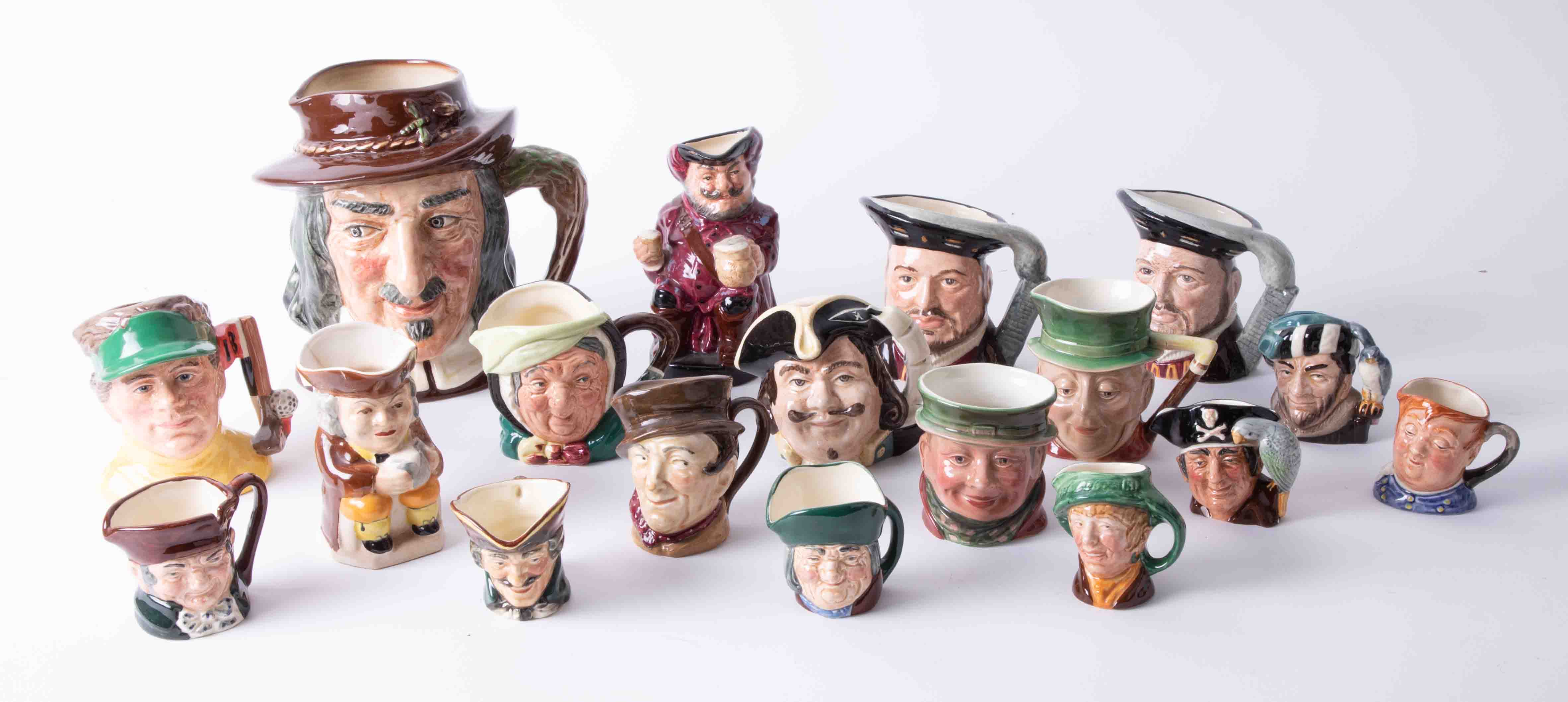 A collection of Royal Doulton small sized character jugs including Sairey Gamp, Fat Boy, The