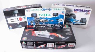 Four boxed scale models including Alpha Romeo 179/179C unbuilt kit, some loose parts bagged, Tyrrell
