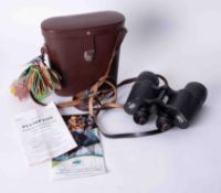 Carl Zeiss, a pair of Jenna binoculars with a collection of horse racing tags and pamphlets.