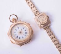 A 14ct yellow gold fob watch with enamelled dial and keyless movement together with a vintage ladies