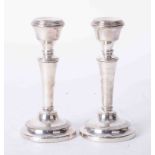 A pair of short silver desk candlesticks, height 16cm.