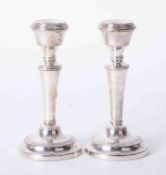 A pair of short silver desk candlesticks, height 16cm.