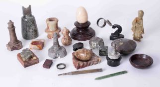 A collection of various serpentine ornaments and carvings, also a damaged Oriental green hardstone