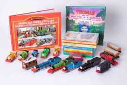 A collection of Thomas The Tank Engine models and books (list available)