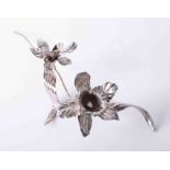 A large silver flower display, hallmarked London, CCFE, length 43cm, approx 5oz.