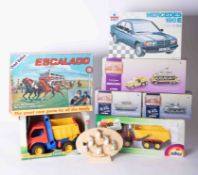 A mixed collection of boxed models including Corgi World War II Collection, Siku truck, scale