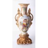 A large 19th Century French? porcelain ornate vase decorated with a panelled portrait of a classical