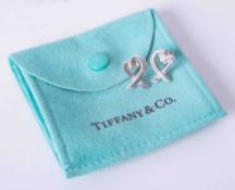 A pair of Silver Tiffany & Co "Loving Heart" Earrings by Paloma Picasso, with post & butterfly