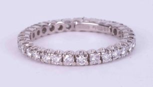 An 18ct white gold full eternity set with approx. 0.93 carats of round brilliant cut diamonds,