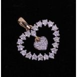 A 9ct yellow gold heart pendant set 0.50 carats of Canadian round brilliant cut diamonds, colour G-H