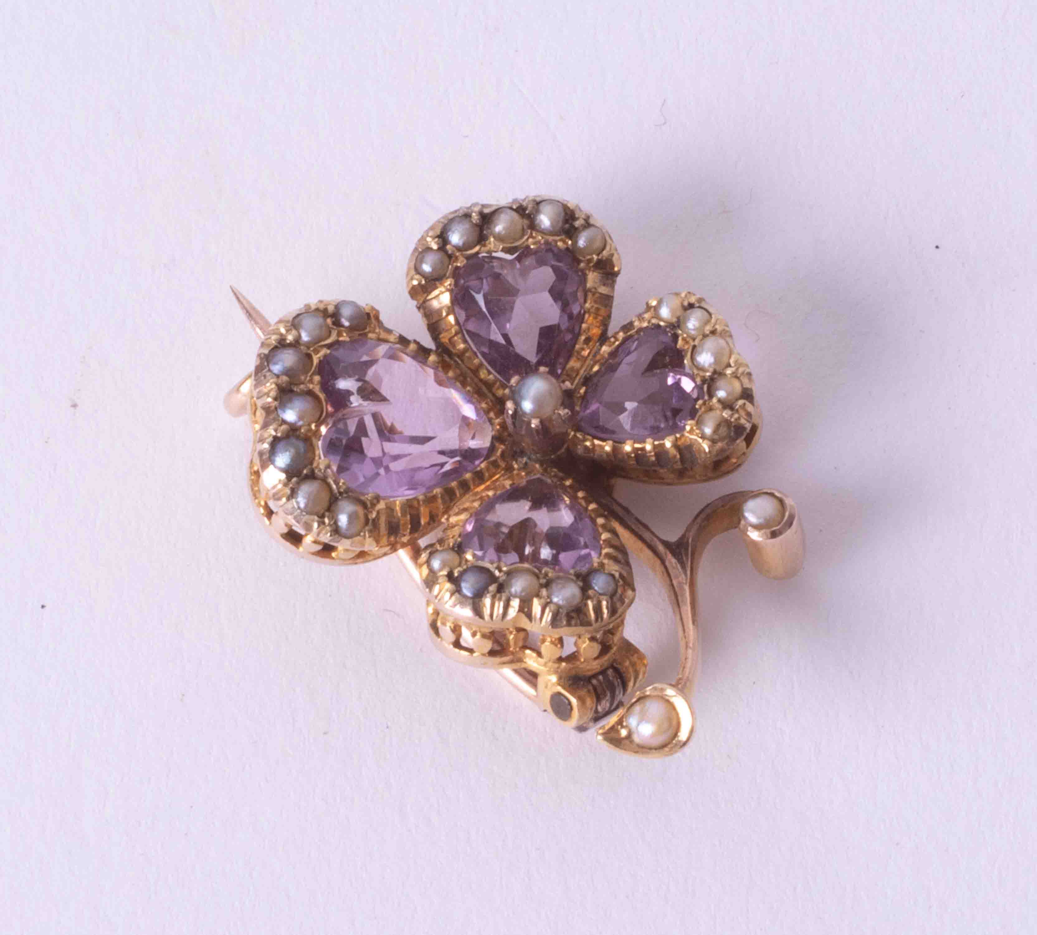A rose & yellow gold (not tested) possibly Continental? Clover leaf shaped brooch set four heart