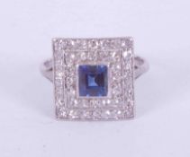 An antique Art Deco style platinum? (no hallmarks) ring in a square design set a central princess