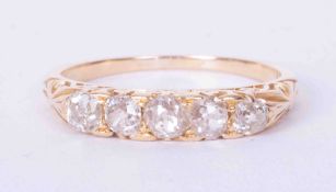 An antique 18ct yellow gold scroll design ring set five old cut diamonds, approx total weight 0.80