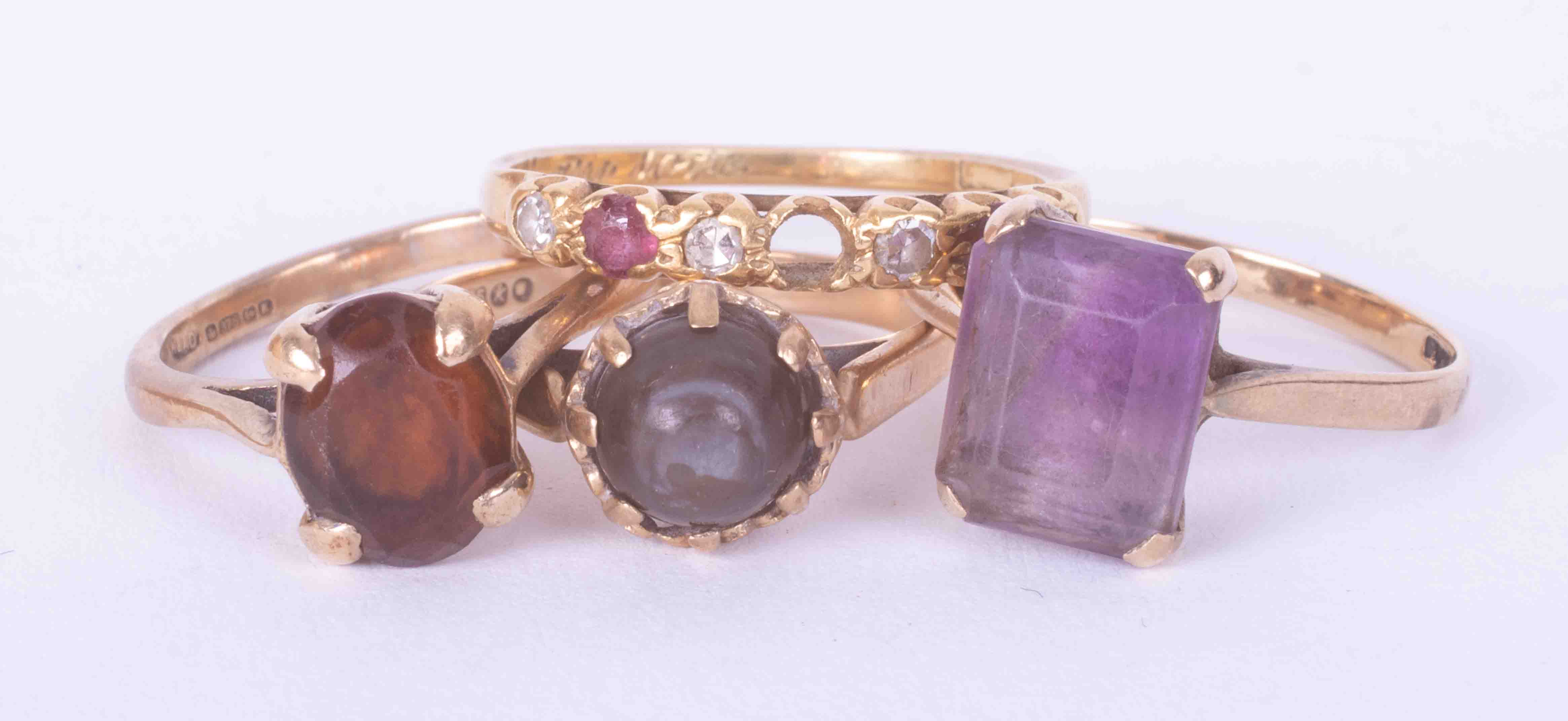 Three 9ct yellow gold rings set amethyst & pearl & smokey quartz? (total weight 6.8g) and an 18ct