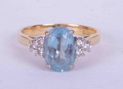 An 18ct yellow & white gold ring set an oval cut Aquamarine approx. 2.00 carats (9.5mm x 6.5mm) with