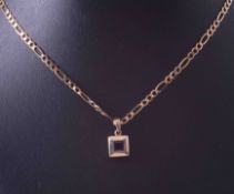 A 9ct yellow gold 18" curb chain with a 9ct yellow gold pendant set square cut amethyst approx. 0.35