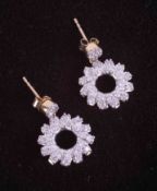 A pair of 9ct yellow & white gold flower swirl design drop earrings set 0.75 carats (total weight)