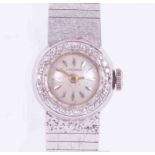 Longines, a ladies 18ct white gold & diamond vintage cocktail watch, bracelet clasp