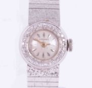 Longines, a ladies 18ct white gold & diamond vintage cocktail watch, bracelet clasp