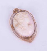 A 9ct yellow gold Cameo pendant, weight 8.09g, measurement approx 4.5cm x 2.5cm.