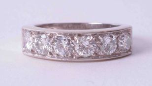 An 18ct white gold six stone ring set approx. 1.32 carats of round brilliant cut diamonds, colour
