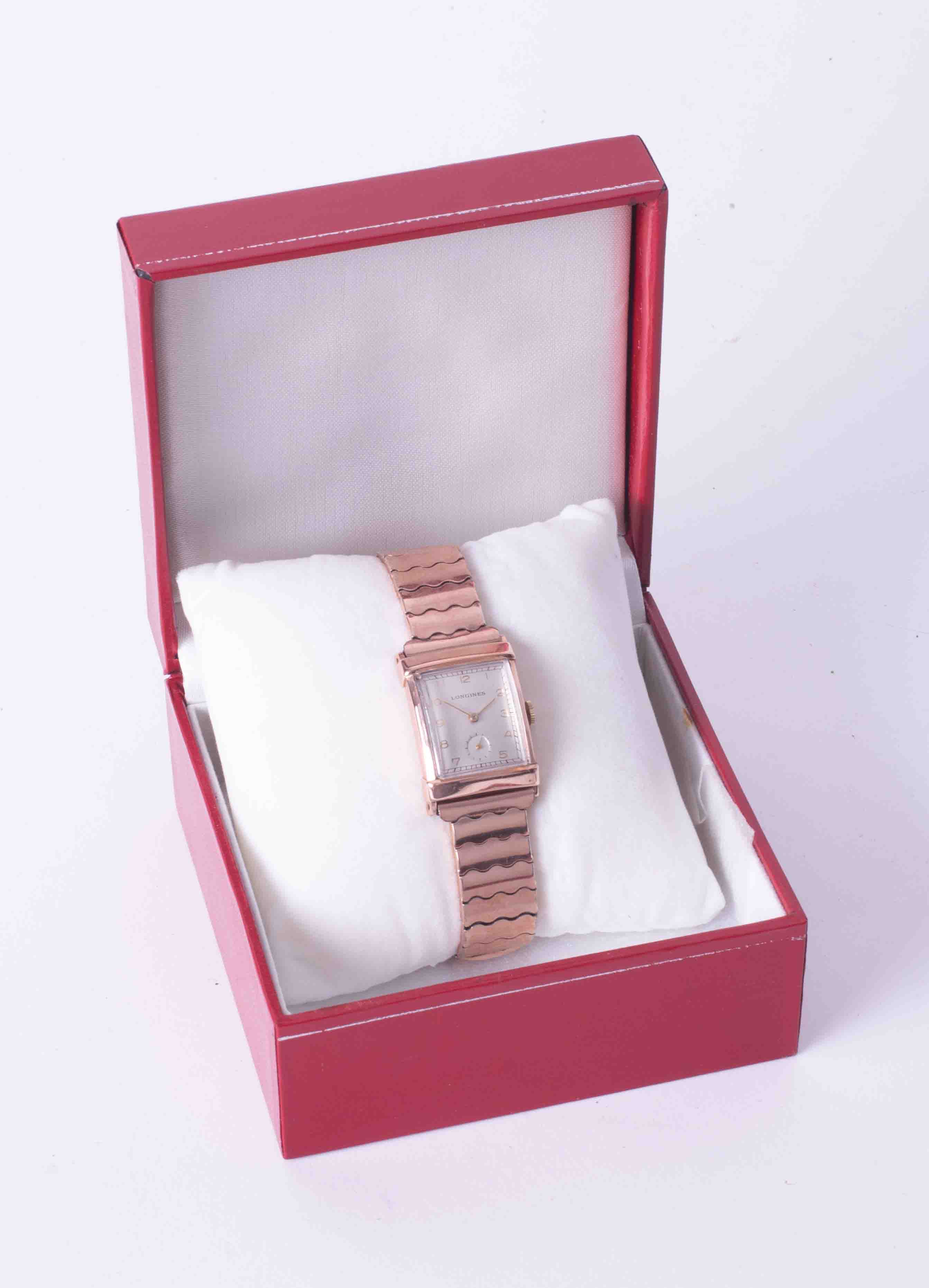 Longines, a gents mid size rectangular cased rose colour (gold filed) wristwatch, integral expanding - Image 2 of 2