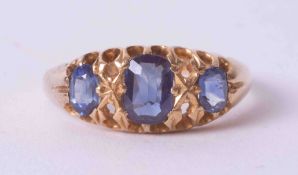 An antique 18ct yellow gold ring set with three oval cut sapphires, total weight approx. 0.90