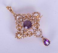 An ornate 15ct yellow gold Continental antique pendant & brooch set with seed pearls (one missing in