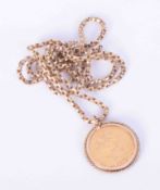 A 9ct yellow gold chain with a pendant mounted 1912 George V full sovereign, weight 20g.