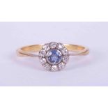 An antique 18ct yellow & white gold flower cluster ring set central sapphire approx. 0.21 carats,